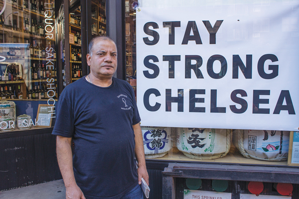 Message received: Binod Bhattarai, of Landmark Wine & Spirits — a stop on Sept. 24’s Chelsea Small Business Crawl. Photo by Naeisha Rose.